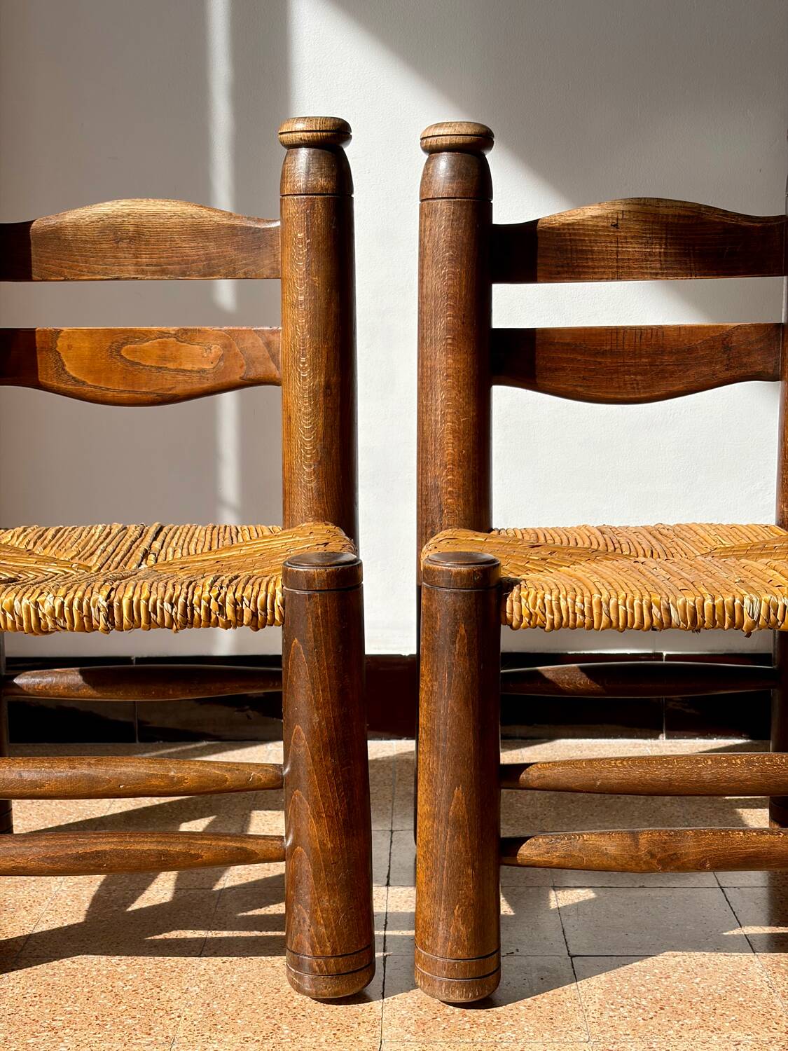 Low fireplace chair attributed to Charles Dudouyt.