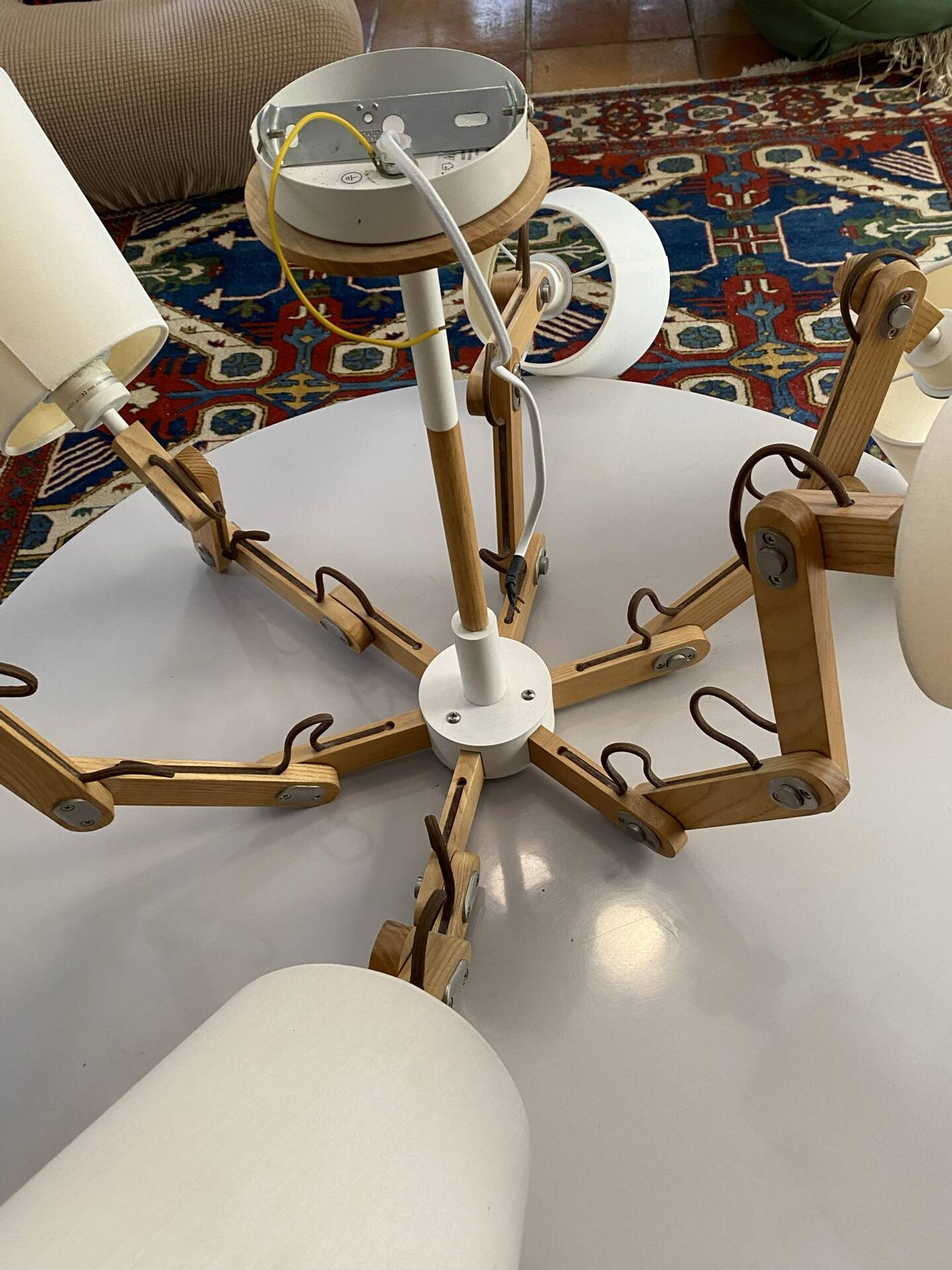Scandinavian chandelier with articulated arms