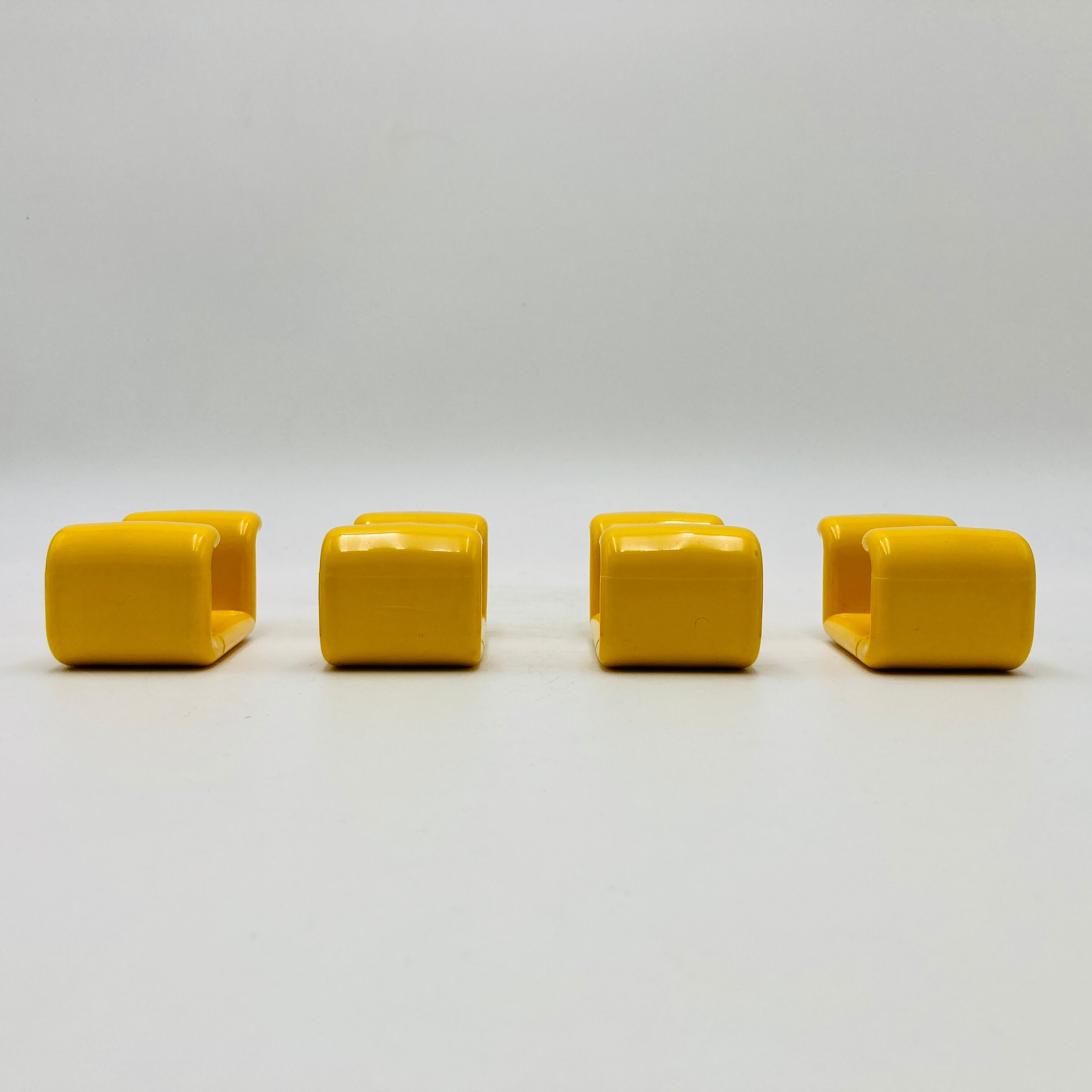 Yellow plastic hooks, design A. Rossari, Gedy edition.