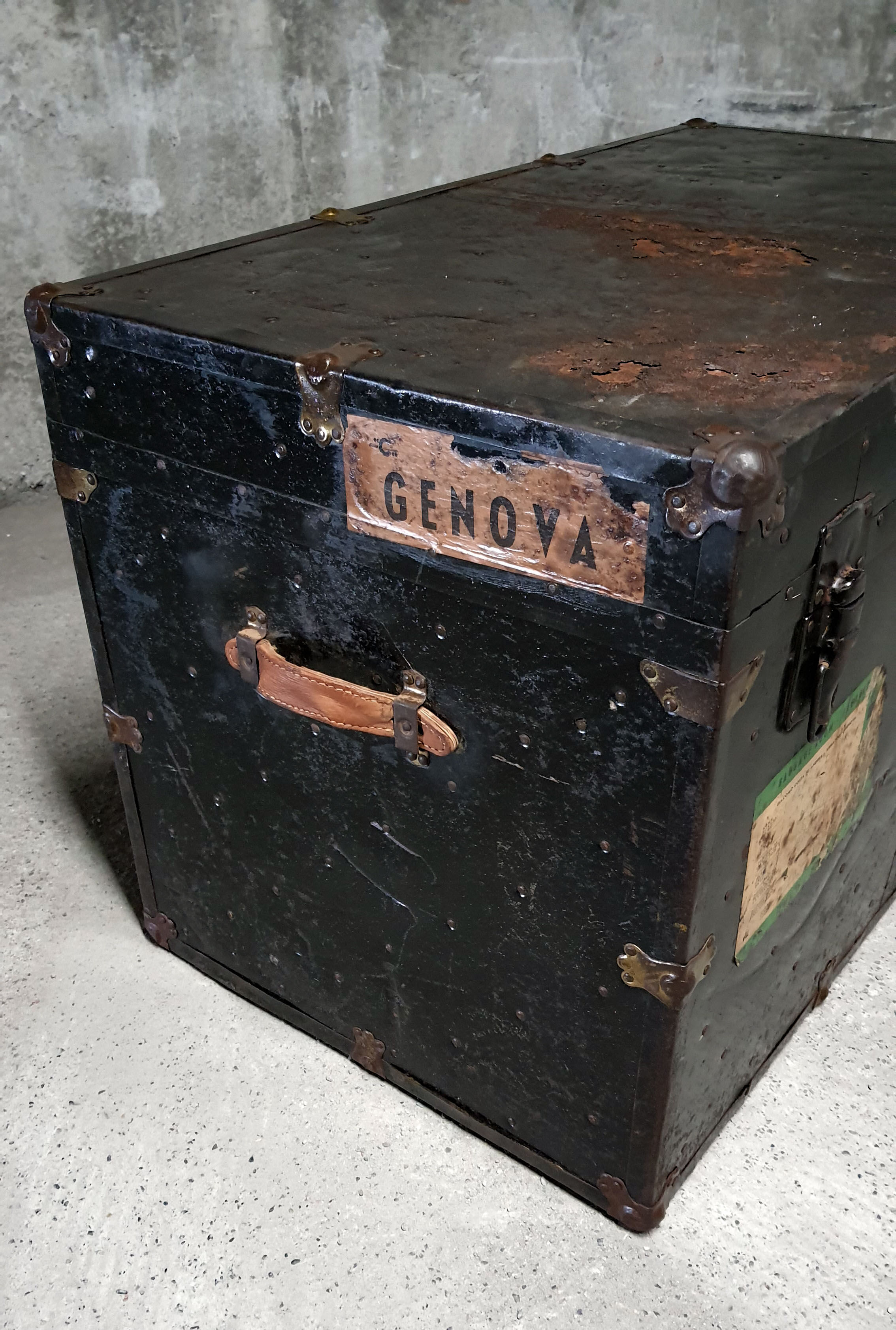 Riveted metal travel trunk