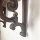 antique oak wall shelf with carved brackets