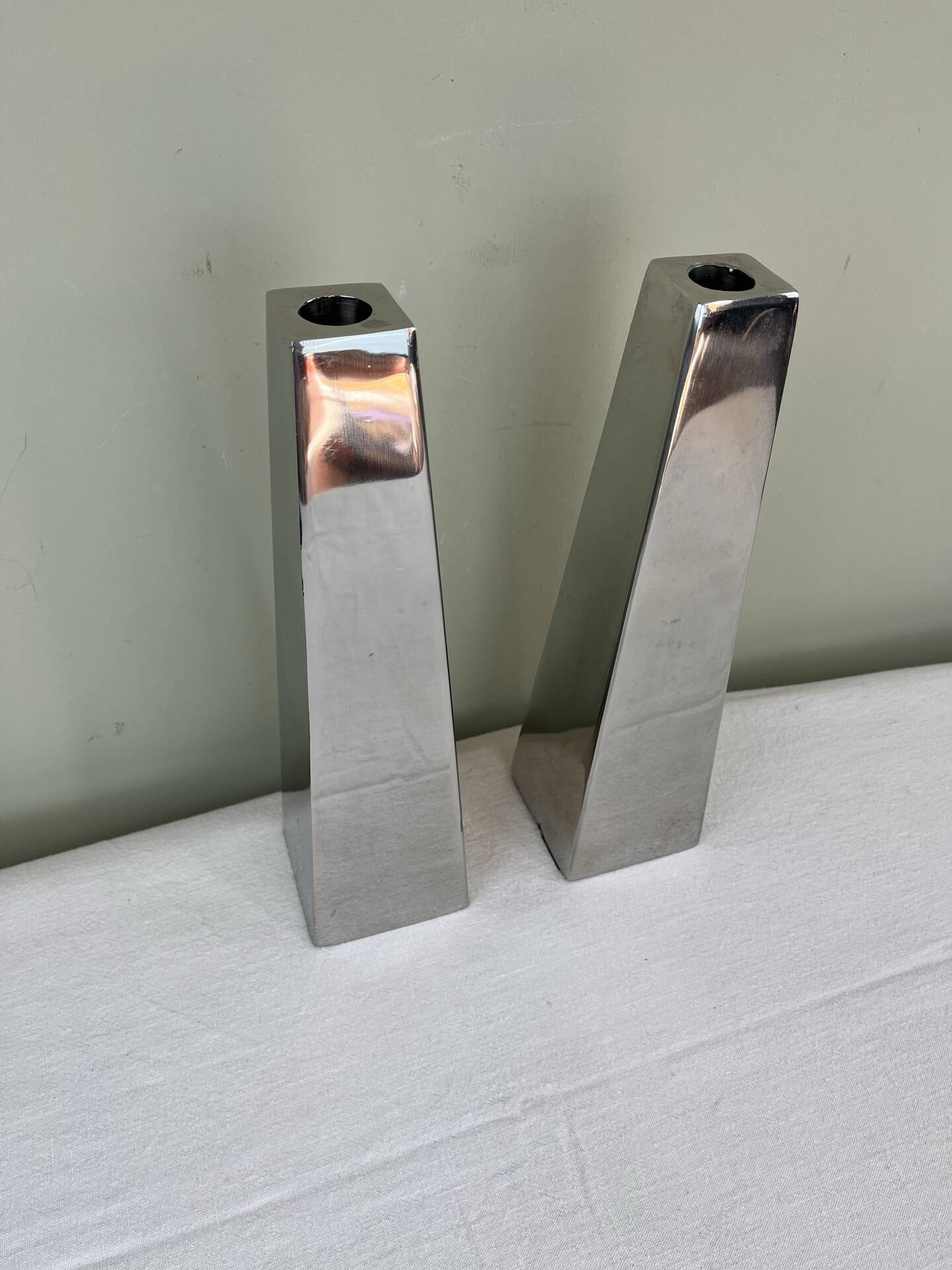Pair of chrome metal candlesticks