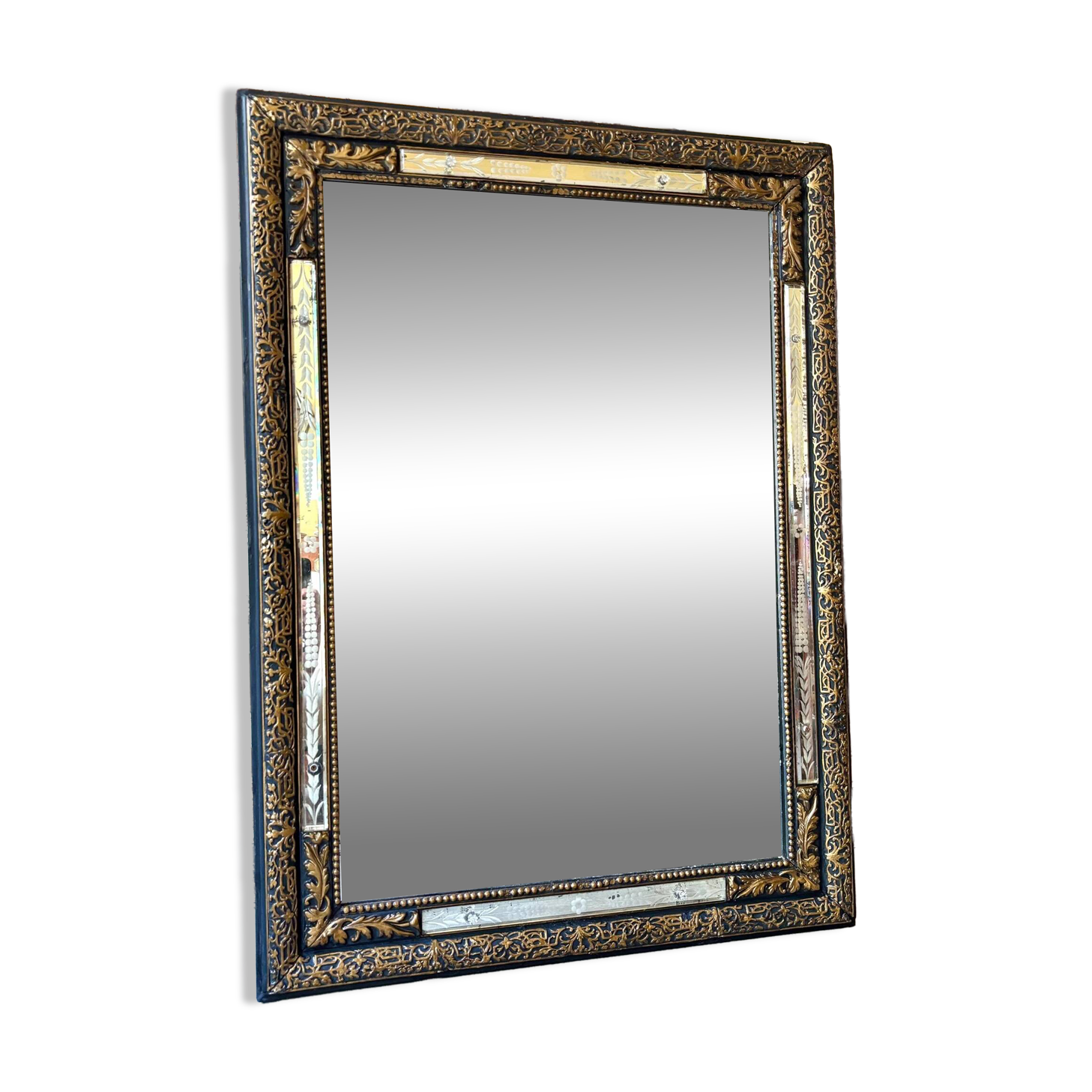 Rectangular Napoleon III mirror in moulded black and gold wood with engraved mirror decoration.