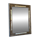 Rectangular Napoleon III mirror in moulded black and gold wood with engraved mirror decoration.