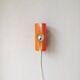 Raak Amsterdam orange wall applique from the 1970s