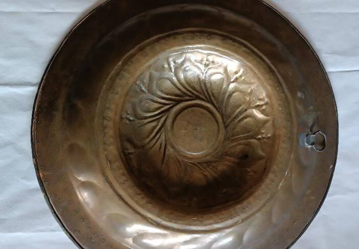 Antique brass alms dish, 17th century