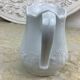 Small white porcelain milk jug