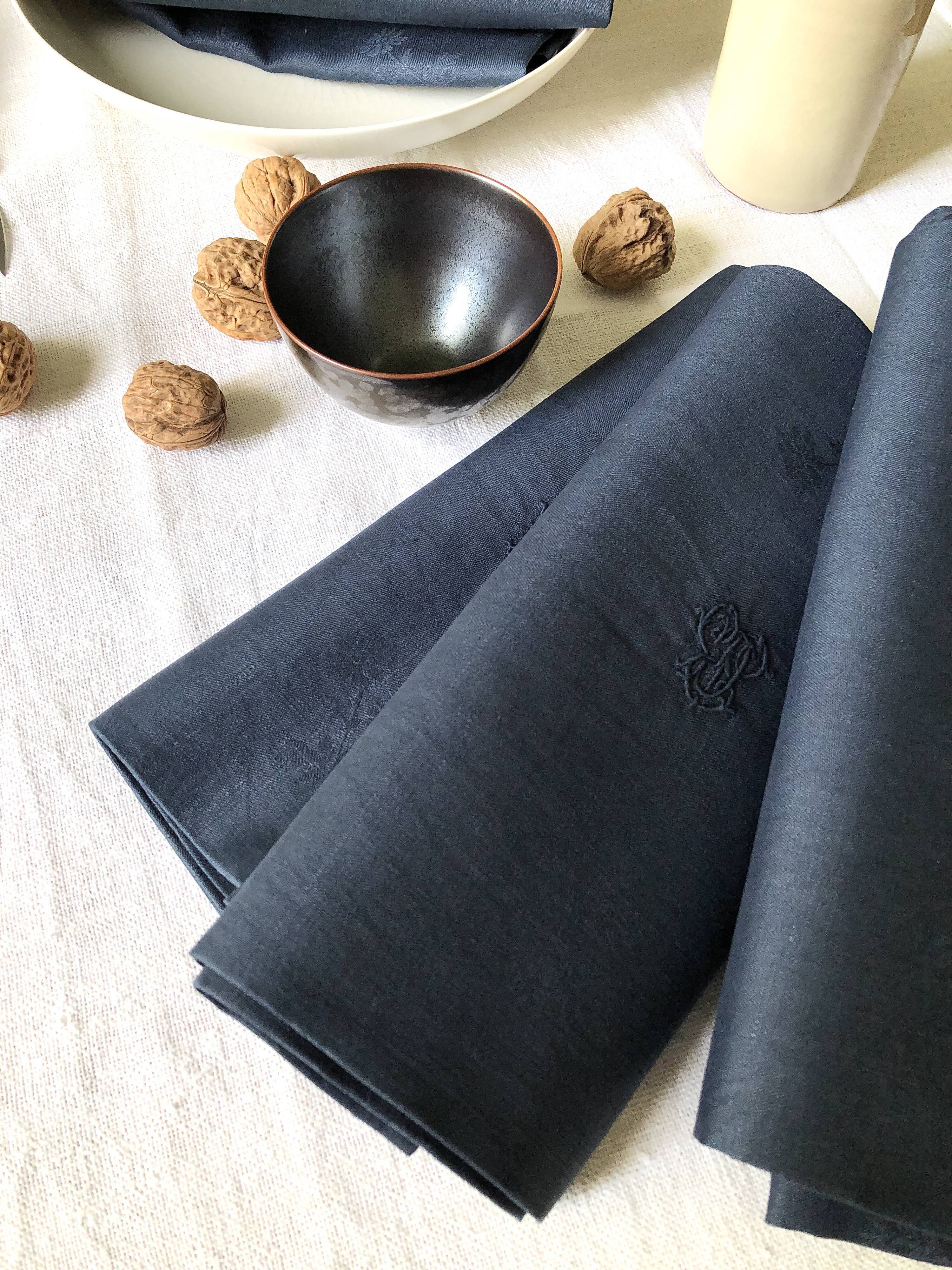 Lot four damasked and monogrammed towels linen and night blue silk