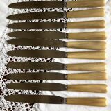 Set of 11 old table knives, horn handle, stainless blade and silver ferrule
