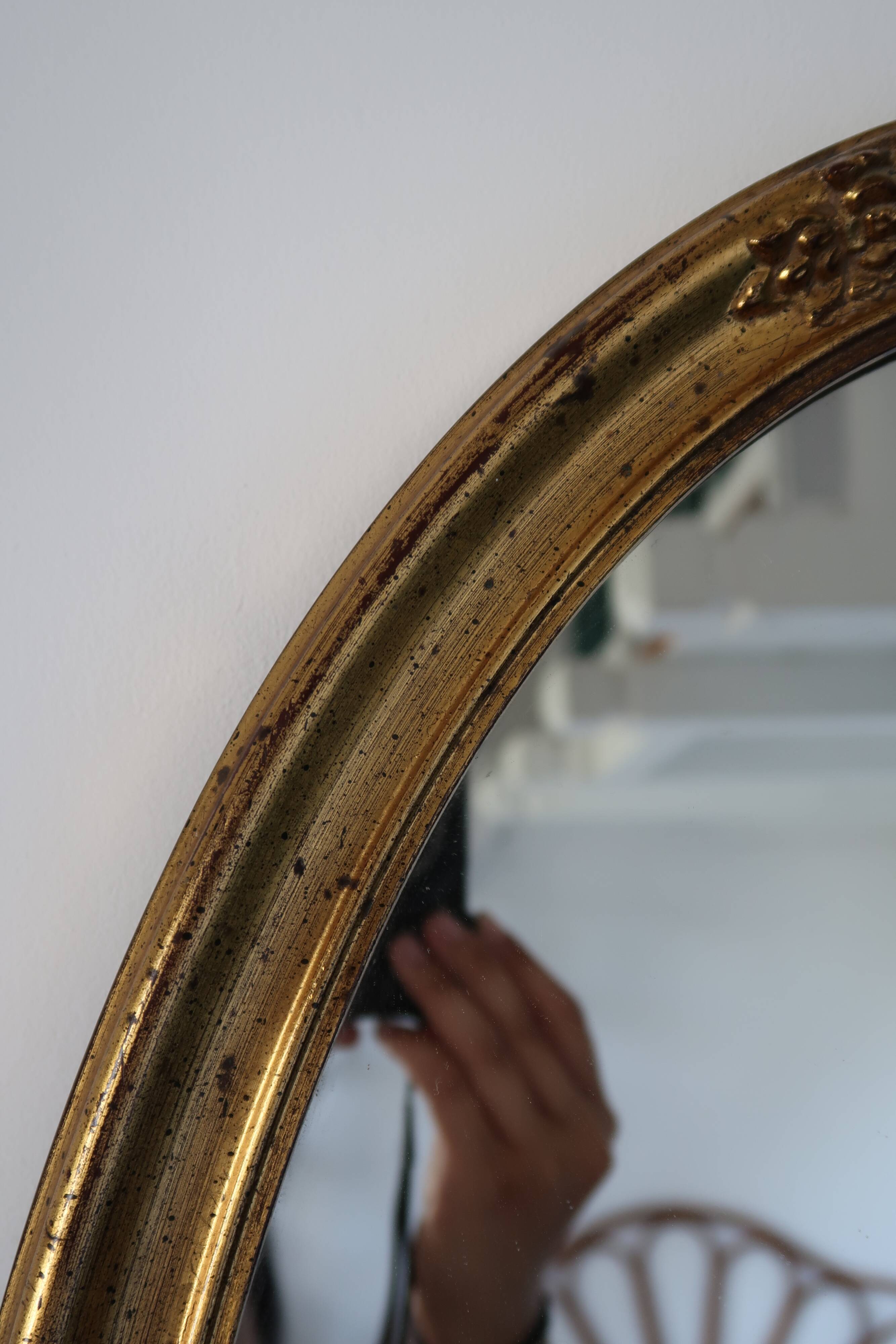 Miroir ovale doré vintage
