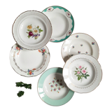 Old hollow plates mismatched in earthenware