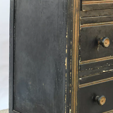 Chest of drawers in black lacquered wood