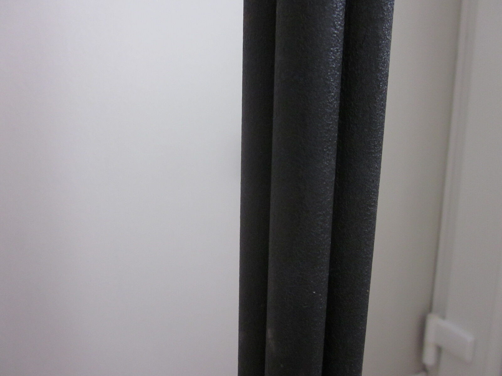 Vintage coat holder has 12 balls