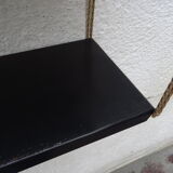 Metal thong wall shelf
