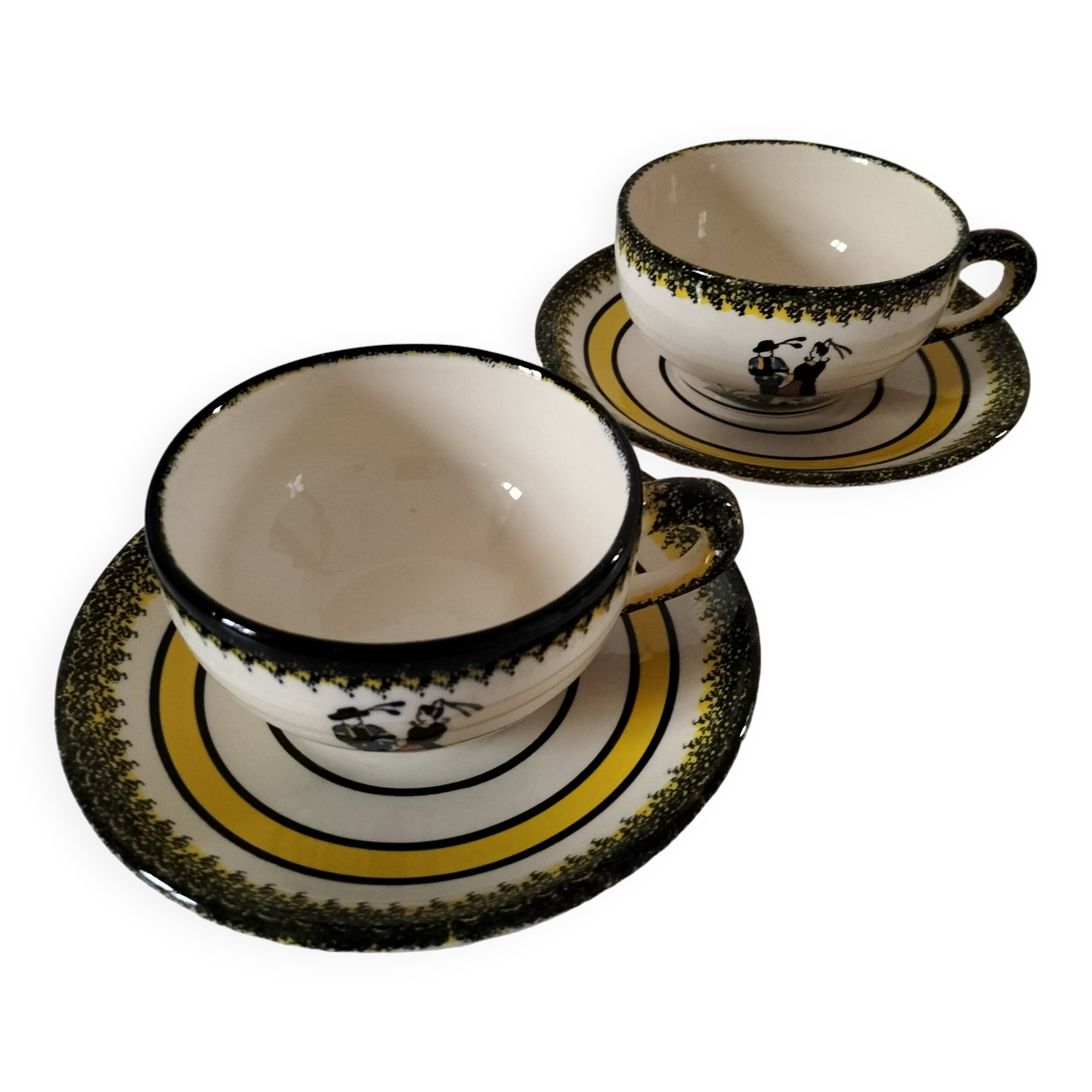 Two Henriot Quimper cups and saucers