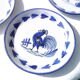 4 Quimper earthenware hollow plates decorated with blue rooster