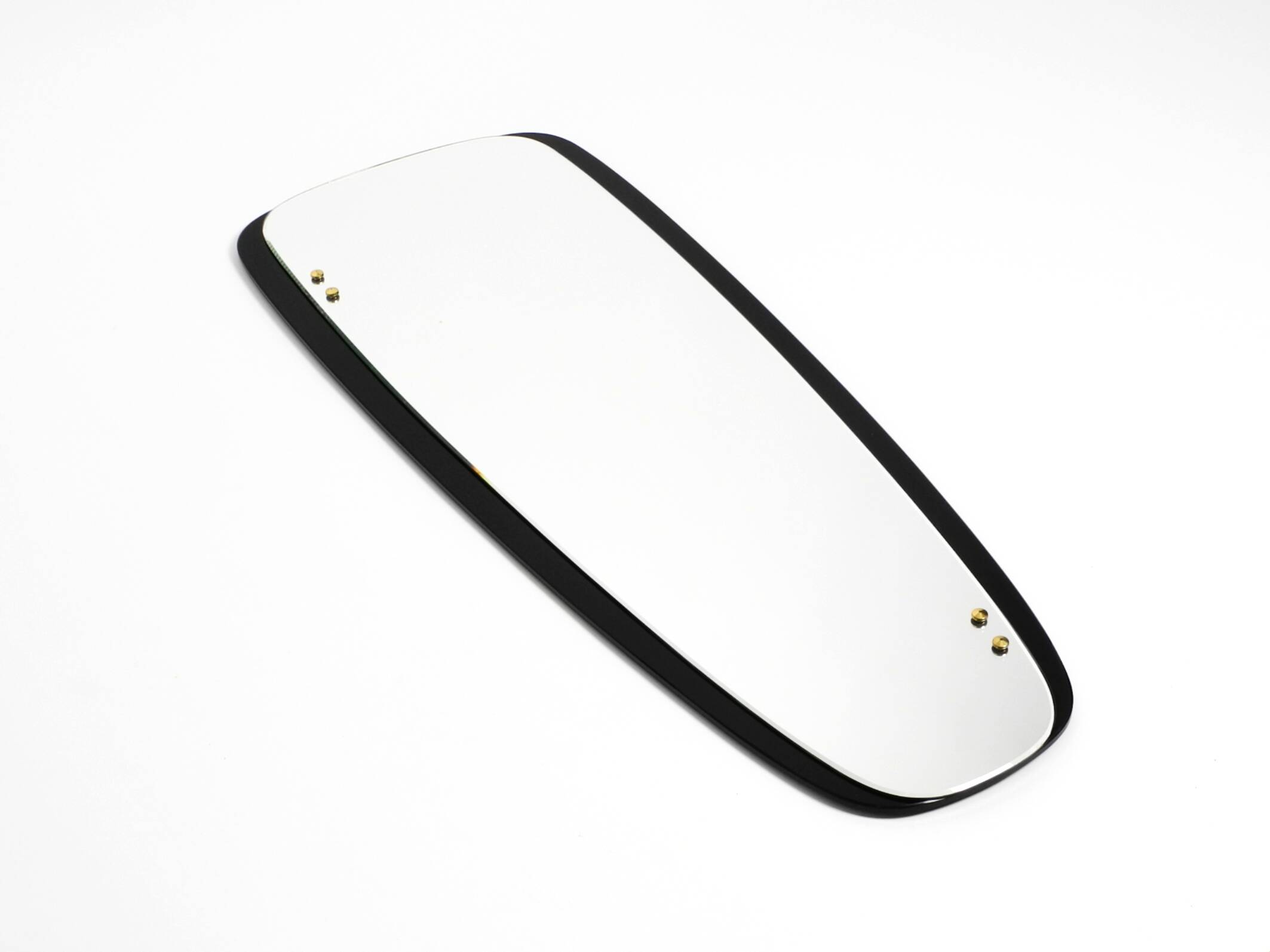 Large Mid Century wall mirror with extraordinary black glass frame