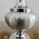 Brushed aluminum and chrome lamp typical of the 70s