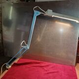 Articulated blue desk lamp