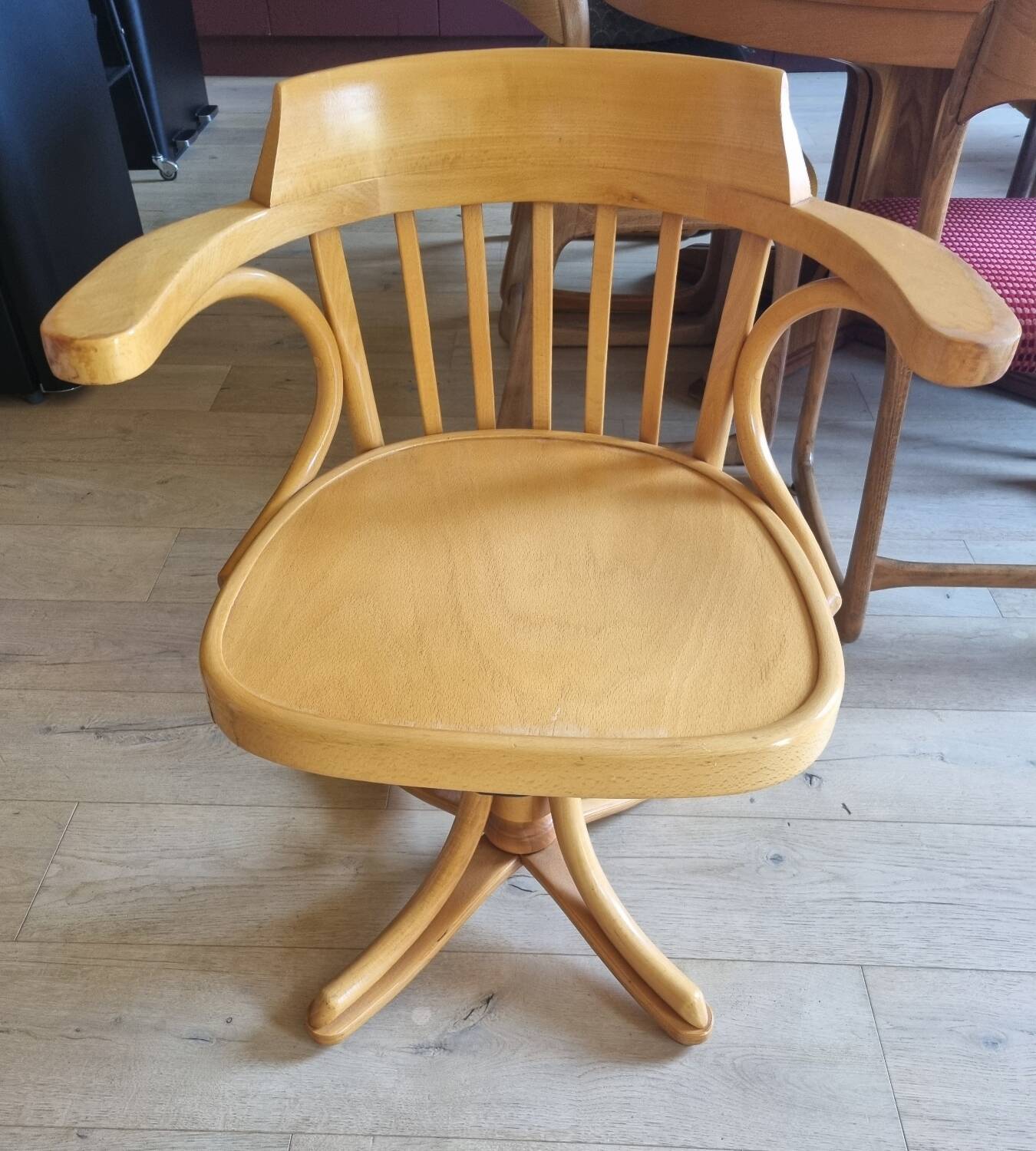 Wooden swivel armchair