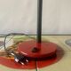 Vintage red and black metal desk lamp