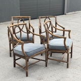 Set of 4 vintage McGuire rattan chairs with cushions.
