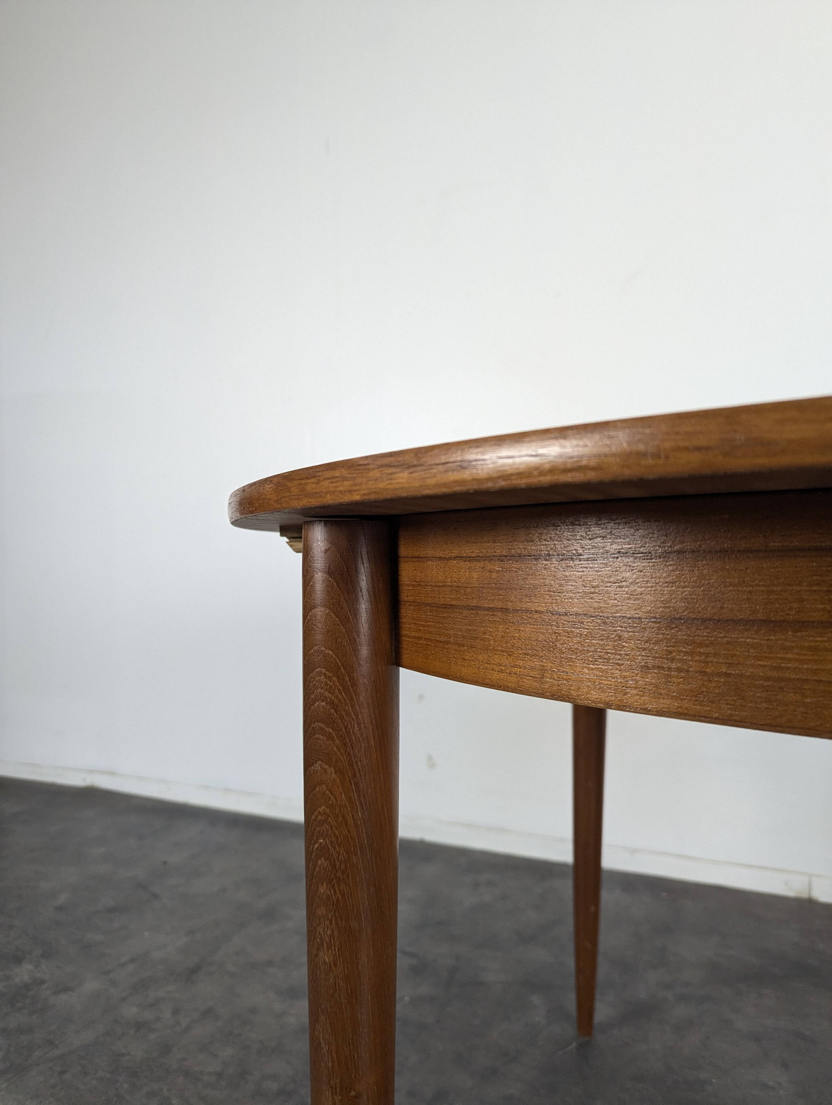 Scandinavian teak table with extension.