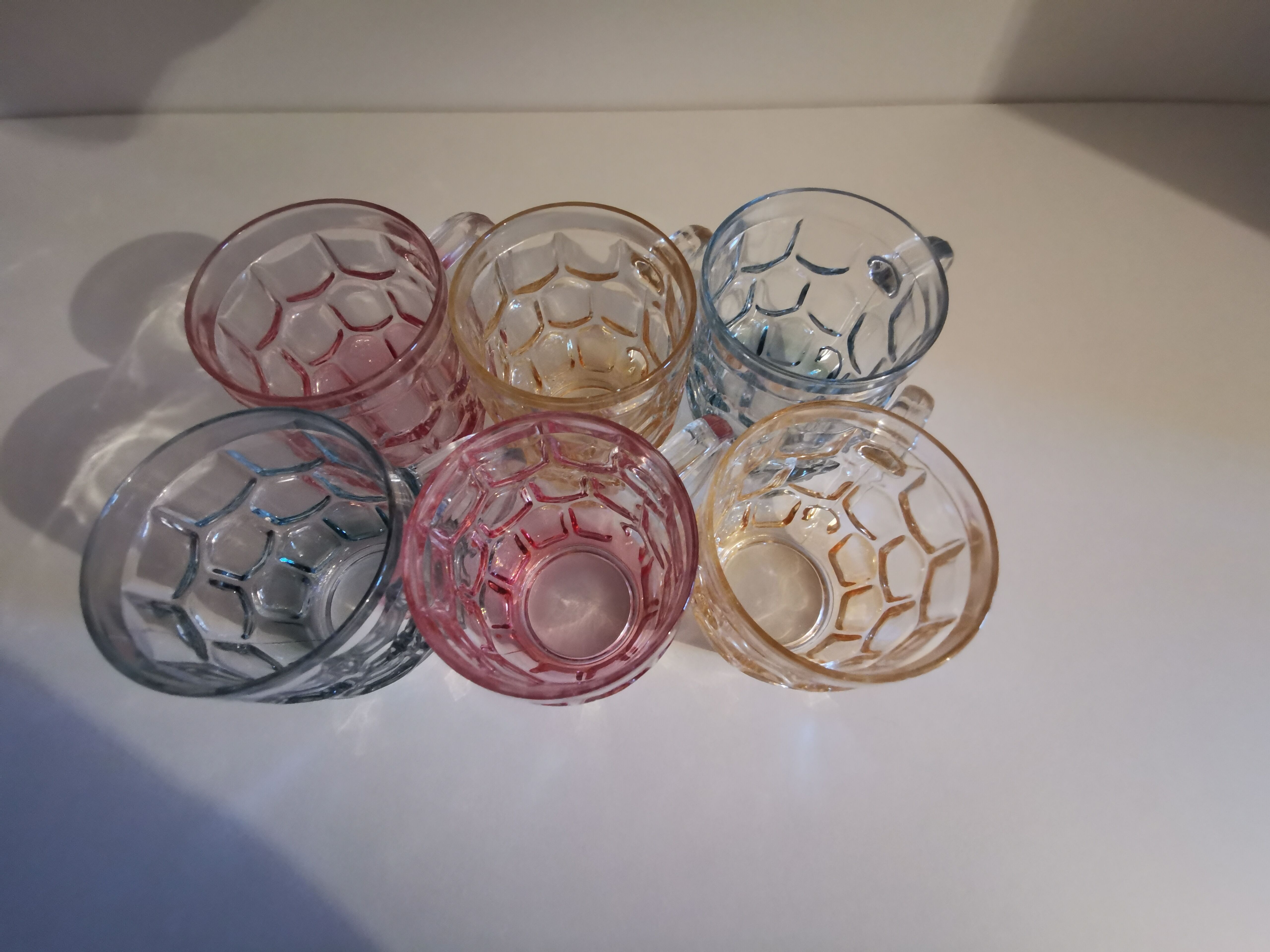 Set of 6 multicoloured vintage glass mugs.