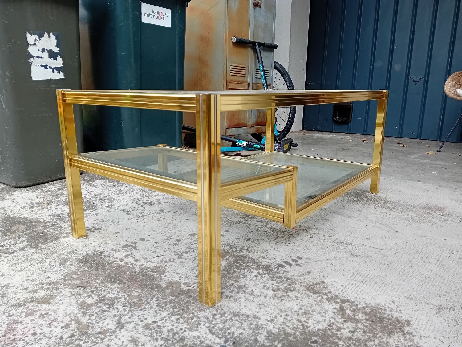 Glass and golden brass coffee table