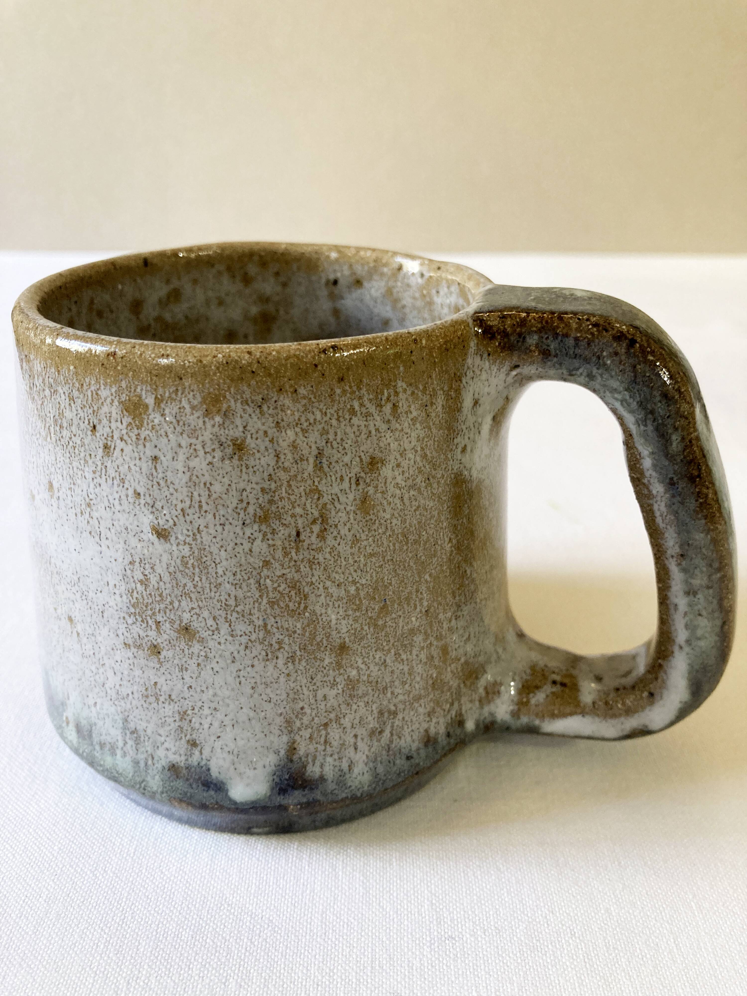 Trio of stoneware mugs