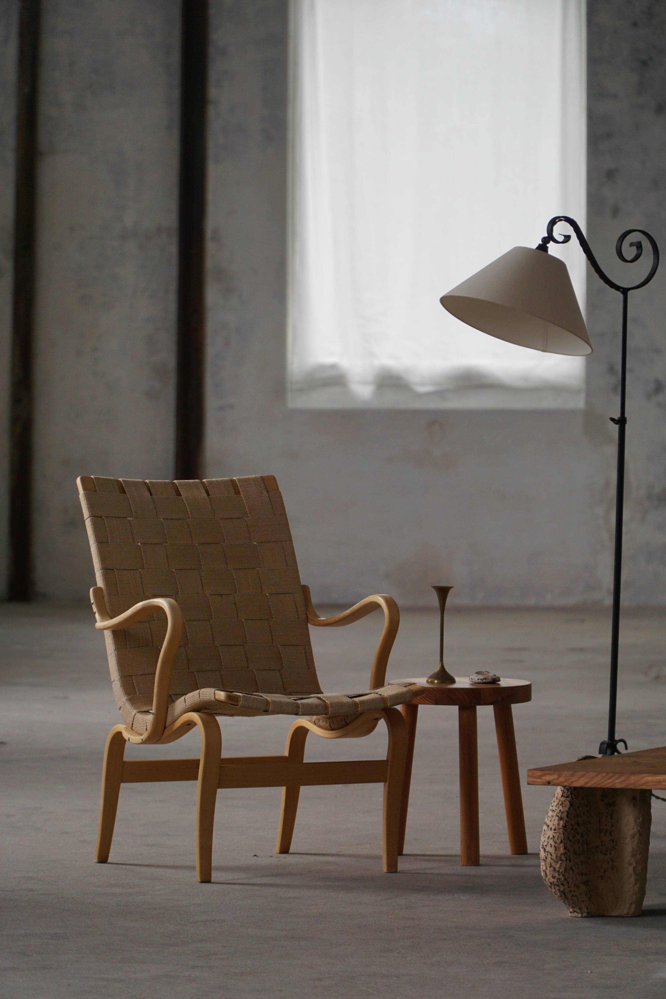 Pair of Swedish armchairs from the mid-century by Bruno Mathsson, model "Eva", 1960s.