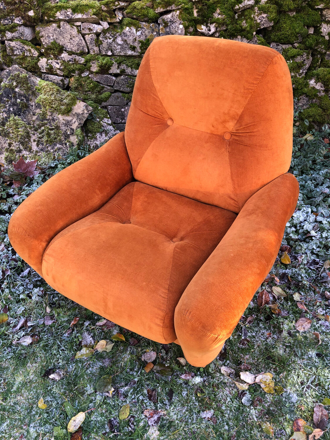 Orange velvet armchair