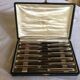 12 entremet knives, silver metal, cross ribbons