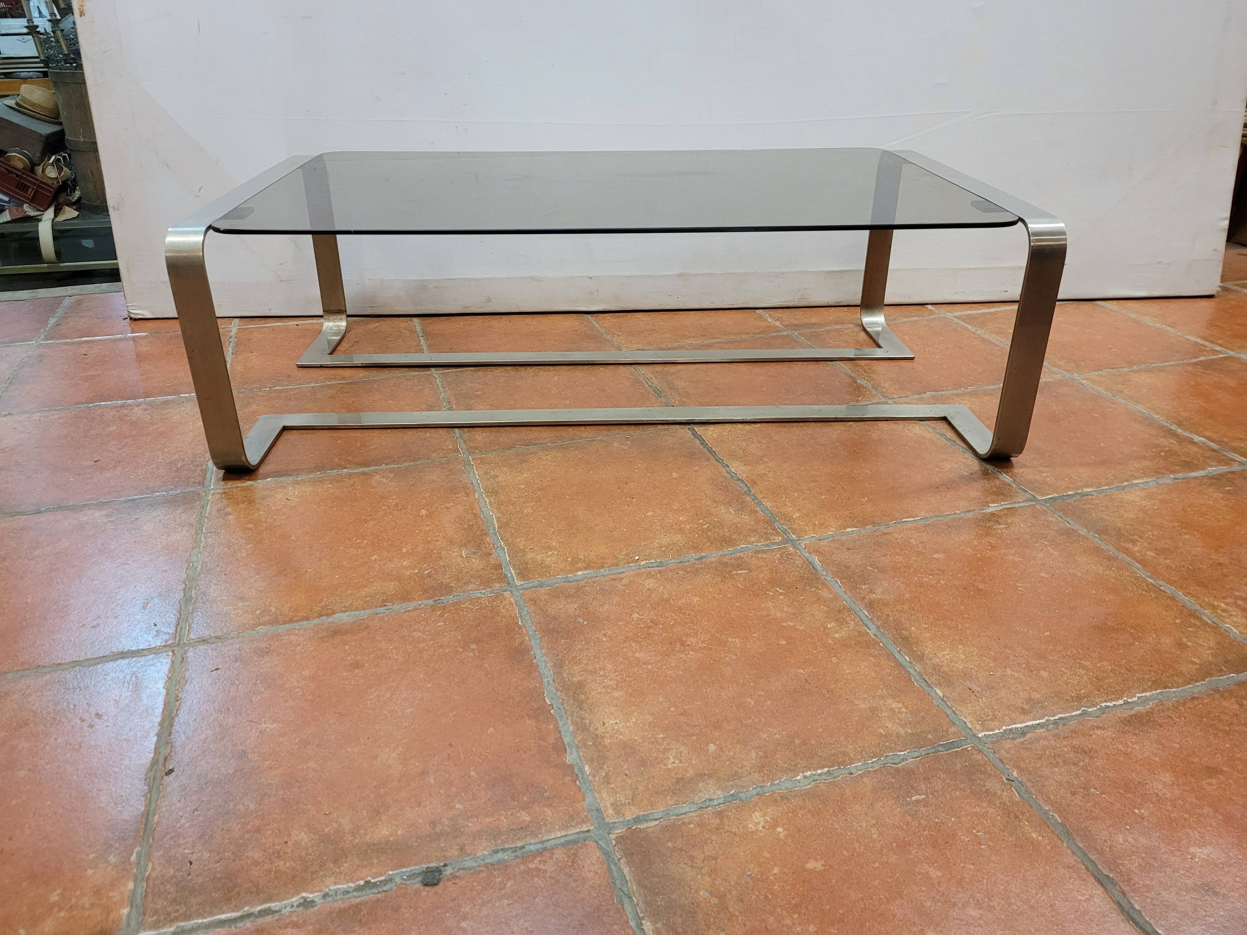 Coffee table with stainless steel base and smoked glass, from the 70s