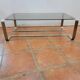Coffee table with stainless steel base and smoked glass, from the 70s
