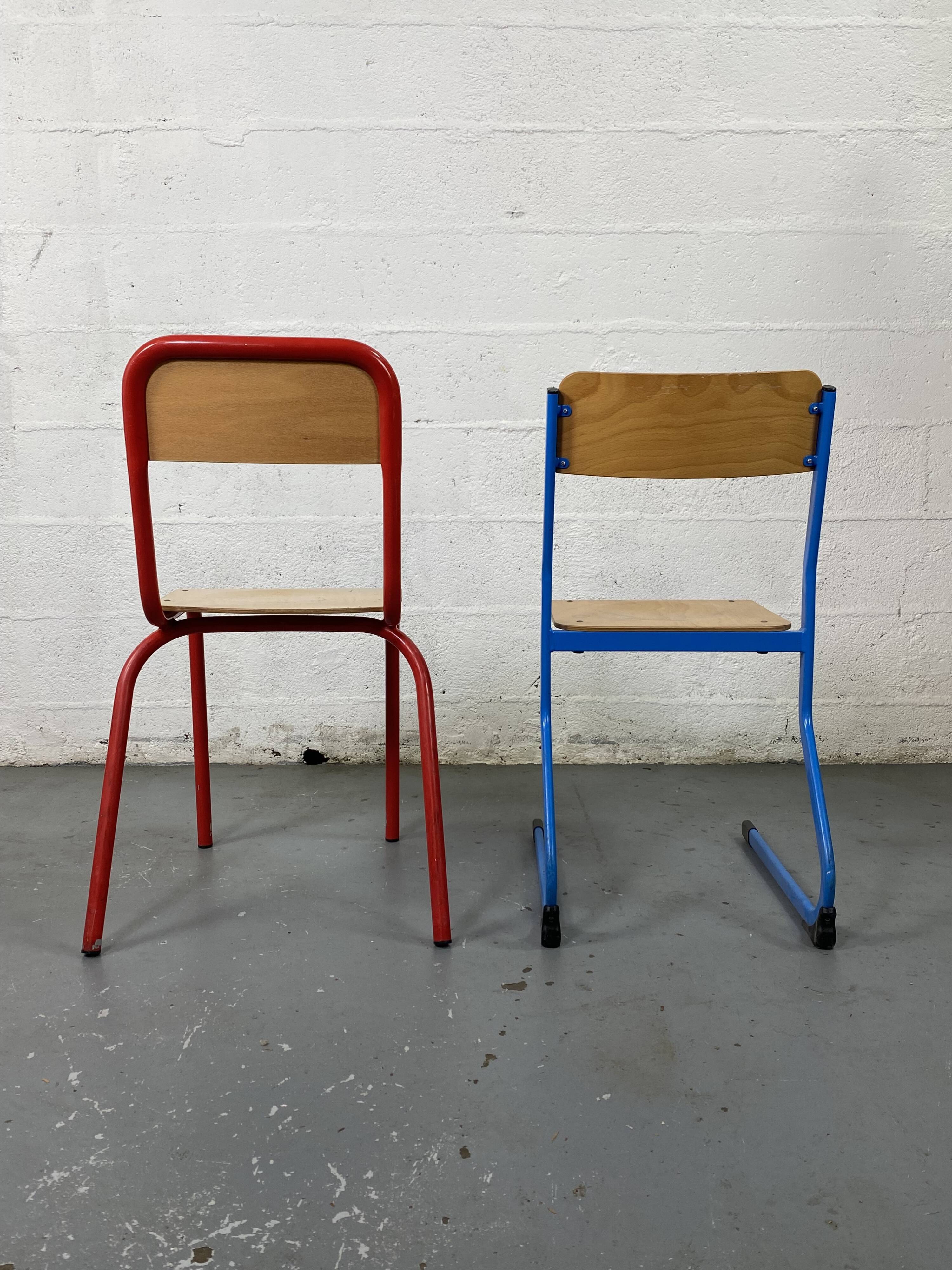 Set of 2 mismatched industrial school chairs