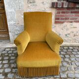 Fauteuil crapaud velours jaune moutarde à franges