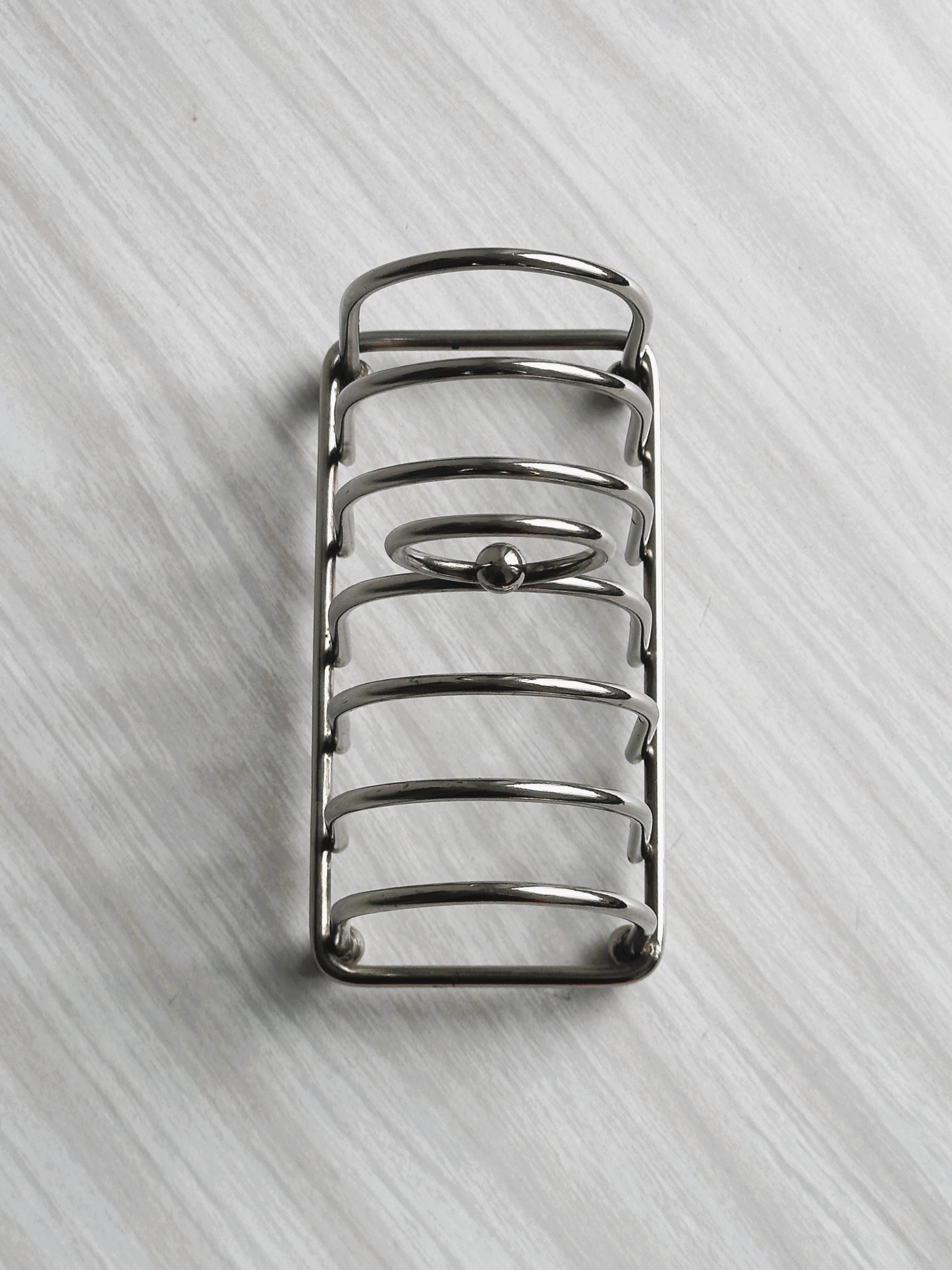 Stainless steel toast rack.