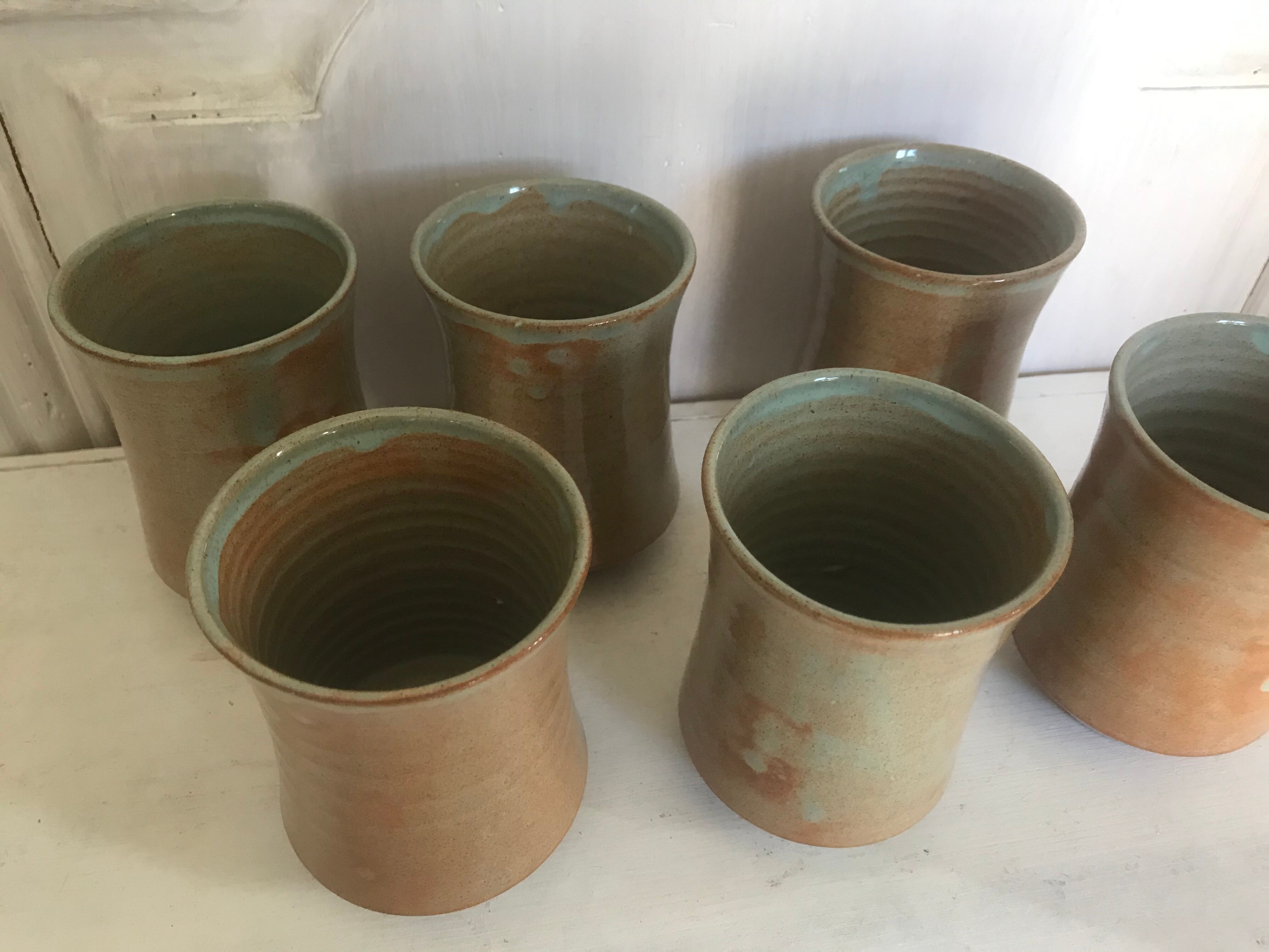 Pitcher and its vintage sandstone glasses