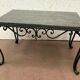 Table basse en fer forgé et marbre XX siècle