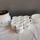 Coffee pot and forget-me-not cups