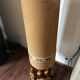Large vintage ceramic table lamp with rose pattern.