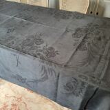 Old damask tablecloth with monogram