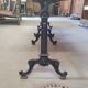 Large bistro table with a wooden top and cast iron legs - 2m56