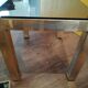 Vintage nesting table in gold metal and smoked mirror glass