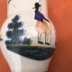 Ancien pichet décor au Breton en faïence HB Quimper