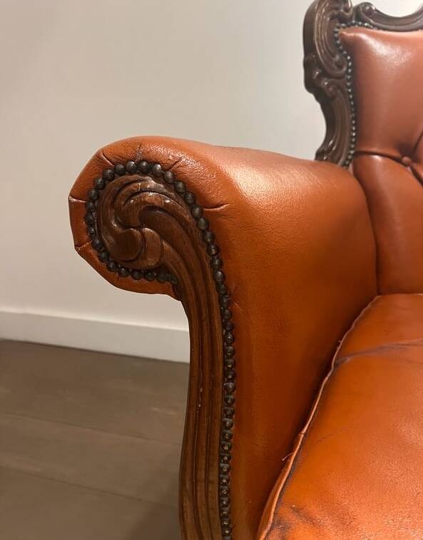Chesterfield-style leather armchair