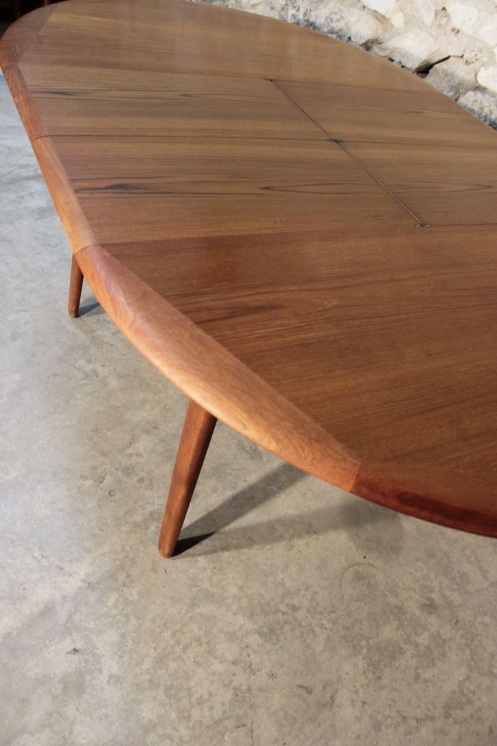 Scandinavian vintage teak dining table with 2 extension cords hidden by Svend Aage Madsen for Knudsen - Son, Denmark