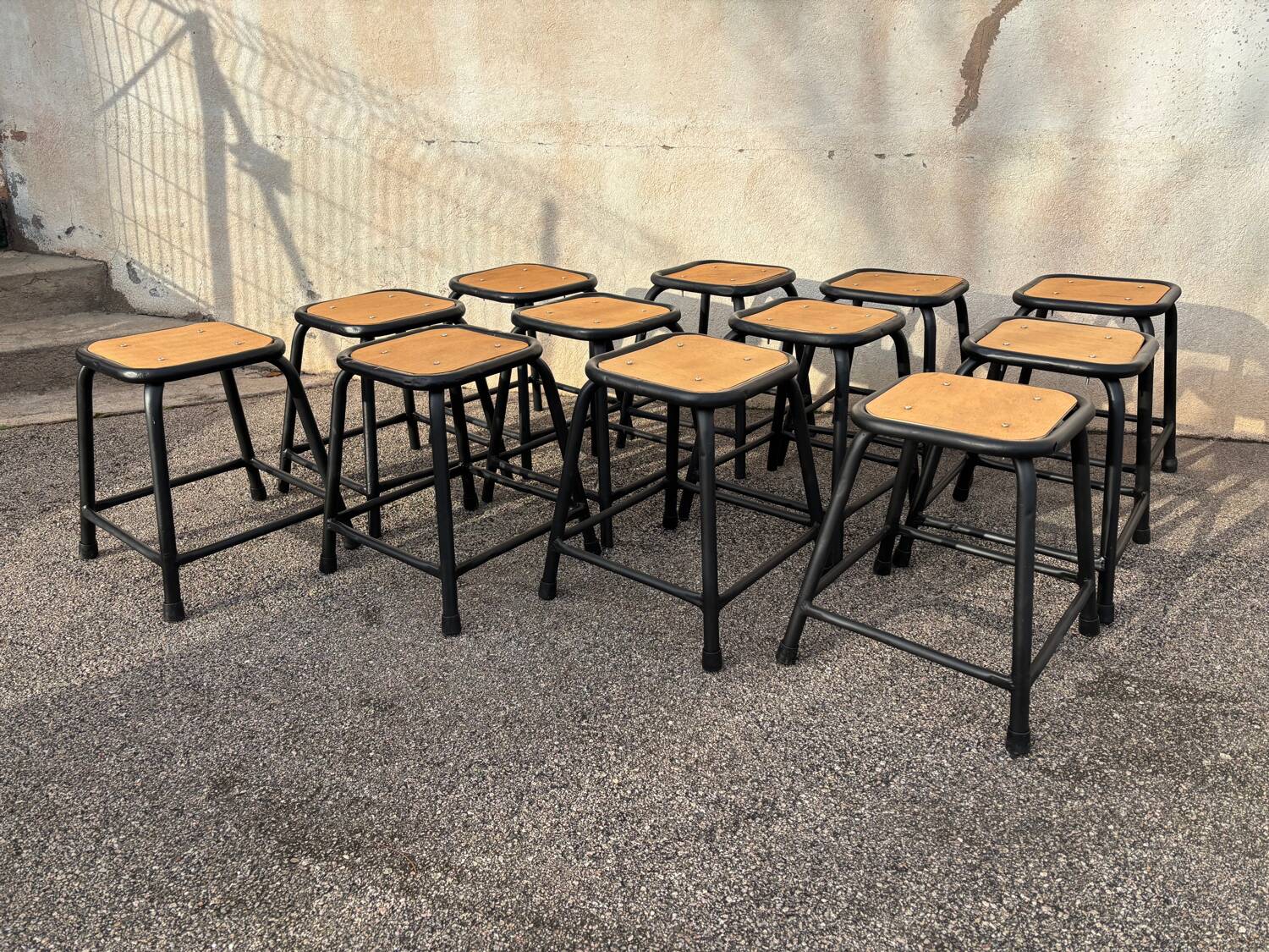 Set of 12 black industrial stools