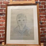 Framed drawing of a boy signed Roy and annotated "Paris 87".